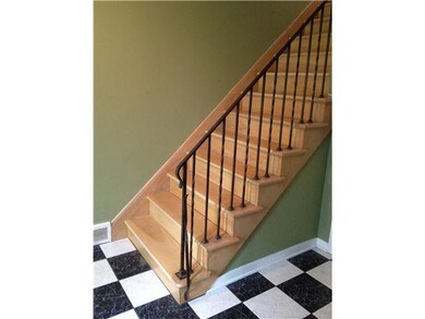 Foyer Black and white marbled ceramic tile floor w