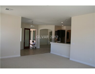 Den. From Great room, looking into nook area and k