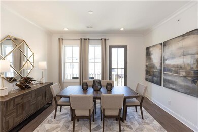 Dining room with plenty of space for your table and buffet. Not actual home.