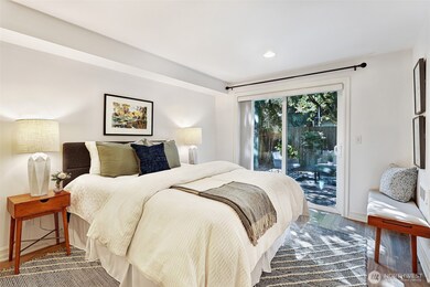 Lower level en-suite bedroom has FULL bath, TWO closets plus under-stair storage and access to fully fenced in yard. Great space for guests, home office, peloton palace? You choose.