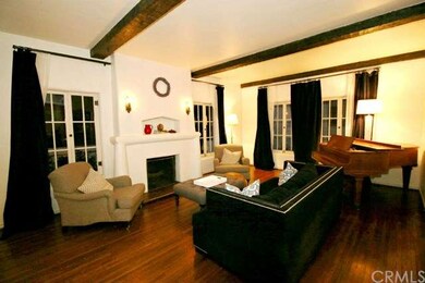 Gorgeous step-down living room with majestic firep
