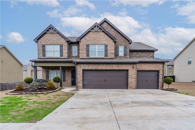 Craftsman inspired home featuring a garage