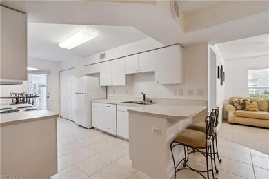kitchen with door opening to front courtyard and d