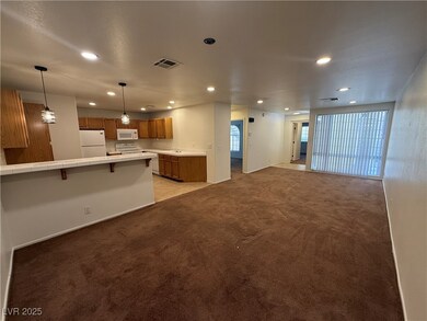 Unfurnished living room with recessed lighting and