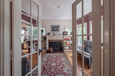 French doors lead into the living...