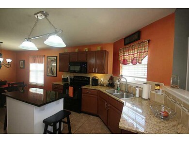 Kitchen. New island installed. Stove and microwave