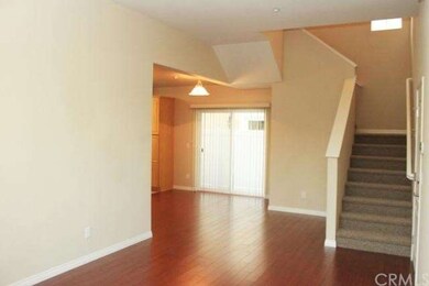 Living room and stairwell.