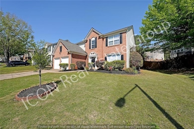 Traditional-style house featuring fence, brick sid