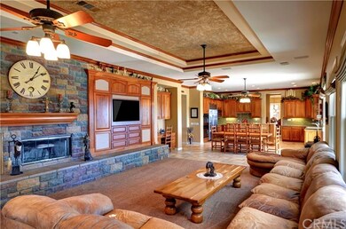 Family room with wood burning fireplace