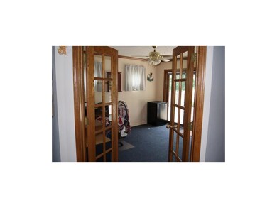 Note French Doors to the office or Study. The door