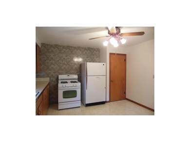 Gas range and refrigerator.