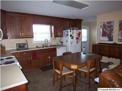 Kitchen with enough room for a buffet or china hutch along with the table.