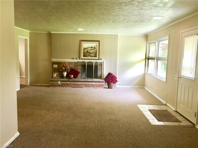 Enter into the Living Room from the front door.