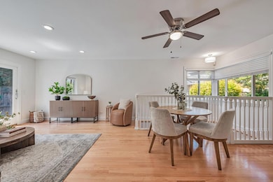 Refinished hardwood floors, new paint and lighting.