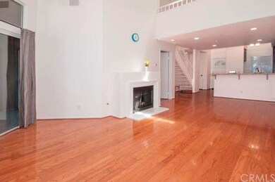 Living room, looking back to the entry and kitchen