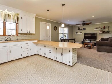 Kitchen offers abundant cabinet...