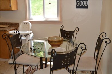 Cute eat-in breakfast area.  Ceramic floors makes 