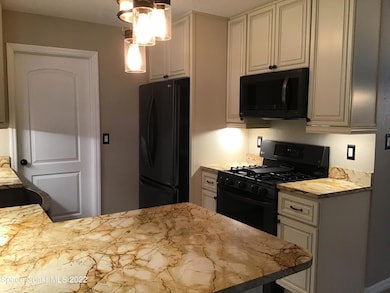 2859 Kingston Ln, Melbourne, FL 32935 - photo 5