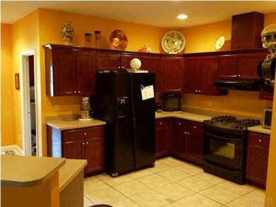 Kitchen with the island removed giving it a more open feel.