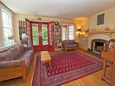 Living Room with French Doors and Beautiful Firepl