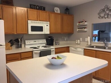 Roomy kitchen w/island for prepping and plenty of 