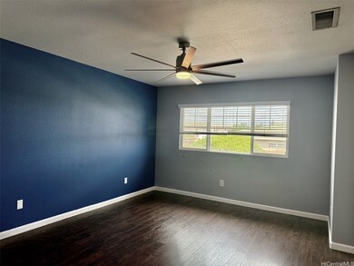 Primary Bedroom with windows and a view