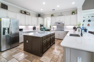 Kitchen featuring stainless steel appliances, sto