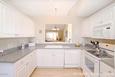 8330 Hawkshead SE unit 44, Byron Center, MI 49315 - photo 4