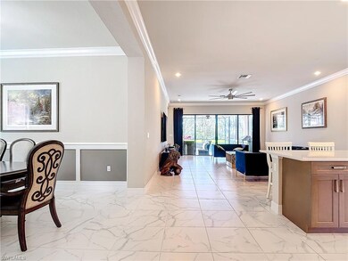 Dining room with crown molding and ceiling fan