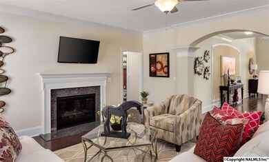 Enjoy a quiet evening by the fire in this beautiful family room which is open to the kitchen.