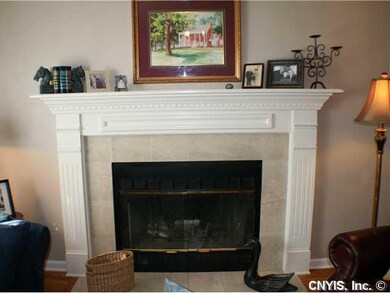 Other. Very tasteful mantle and tile surround the 
