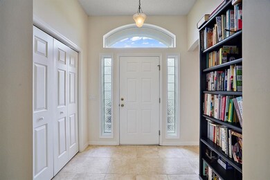 Foyer with closet and high ceiling
