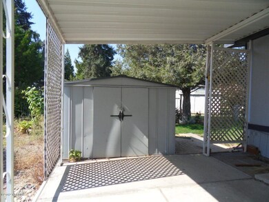 Carport with Storage Shed