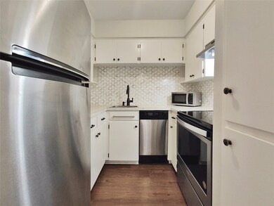 This kitchen offers a suite of stainless appliance