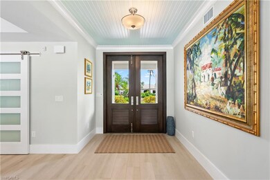 Raised foyer wood ceiling in island like blue!