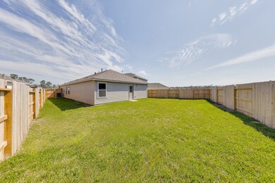 Fenced backyard offers privacy and plenty of space
