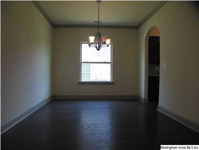 A large dining room with a butler's pantry connect
