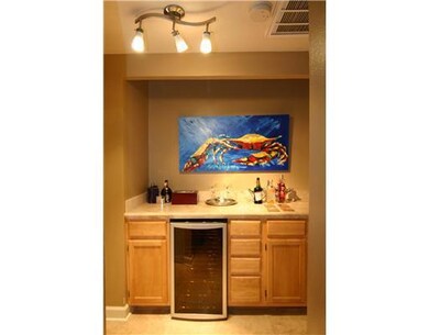 Other. Bar area with wine cooler and built in cabi