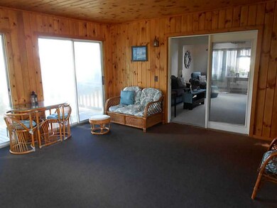 Other. Sun room with deck.