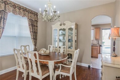 Dining room with engineered wood floors