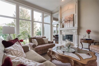 Wall of windows overlooking spectacular backyard!