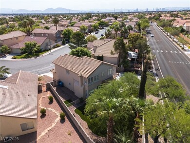 Aerial view of residential area featuring a mounta