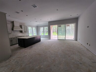 Family room open to kitchen and causal dining/breakfast area. With sliding glass doors opening to the back patio! MUST SEE!