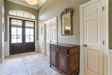 Large entry way and double doors allow lots of nat