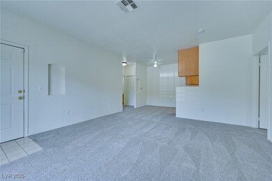 Unfurnished room with light colored carpet and a c