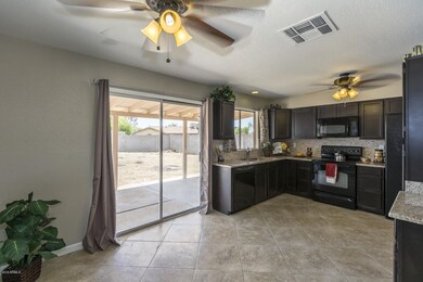 Sliding Glass Door to Rear Covered Patio