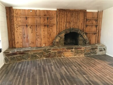 New Wood Laminate Flooring and Woodburning Firepla