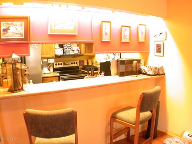 Breakfast bar, view into kitchen