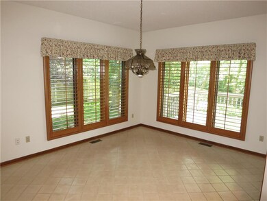 13 X 11 tiled breakfast room adjoining kitchen. Pl