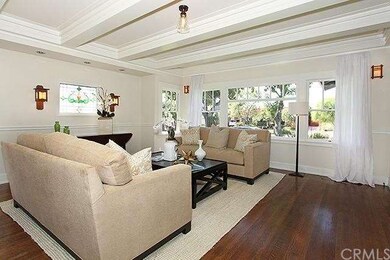 Family room over looks the tree lined street and f
